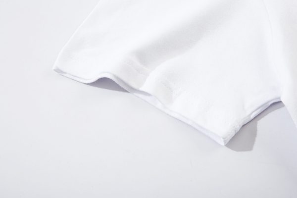 comme-des-garcons-t-shirt-camouflage-1.jpeg Comme des Garçons T-Shirt Friend