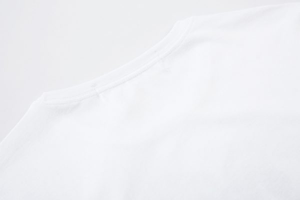 comme-des-garcons-t-shirt-camouflage.jpeg Comme des Garçons T-Shirt Friend